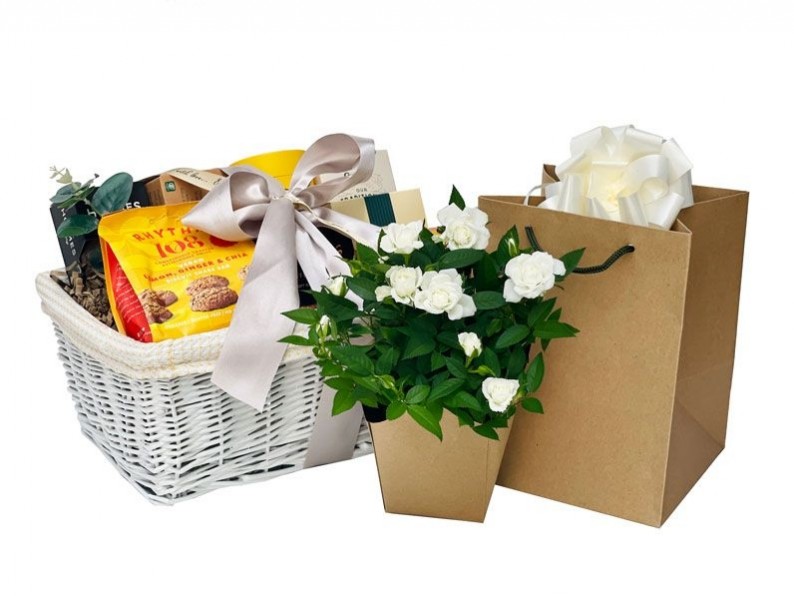 Sympathetic Fayre Gift with Flowers Presented